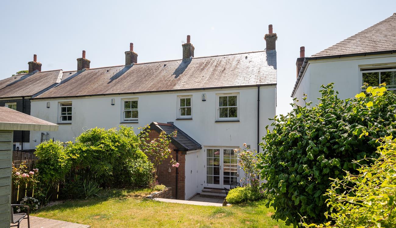 Let your furry friends run off some steam in the spacious garden.