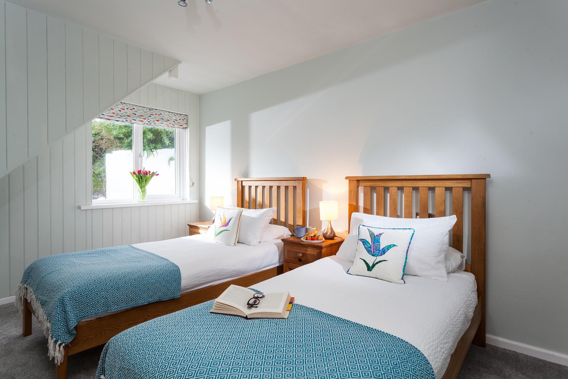 The twin beds are perfect for adults or children to enjoy a dreamy night's sleep.