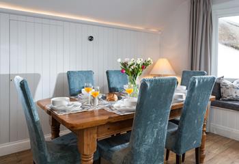 Sit around the dining table and tuck into a hearty cooked breakfast to start the day.