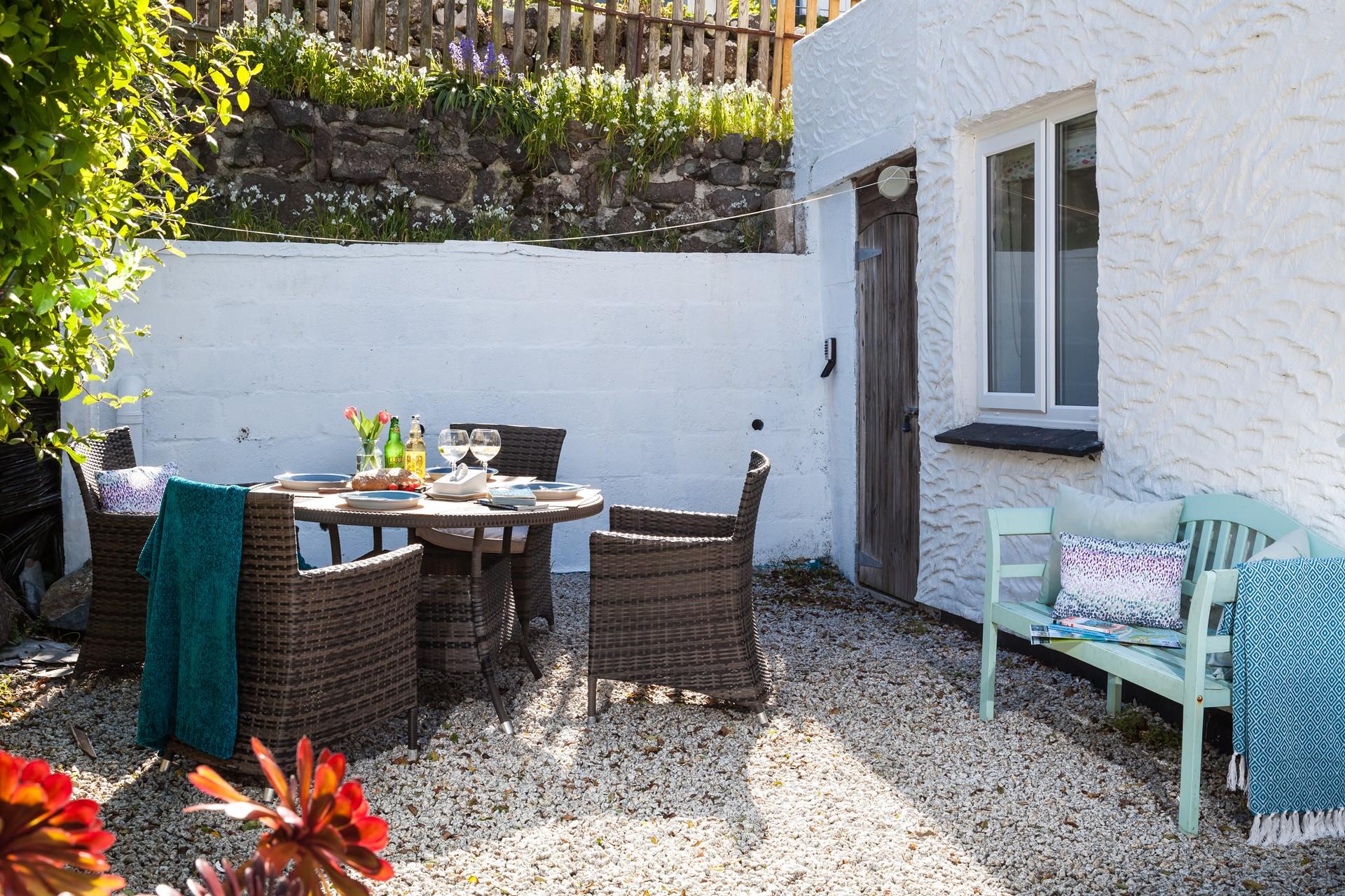 Sip a cold G&T in the garden.