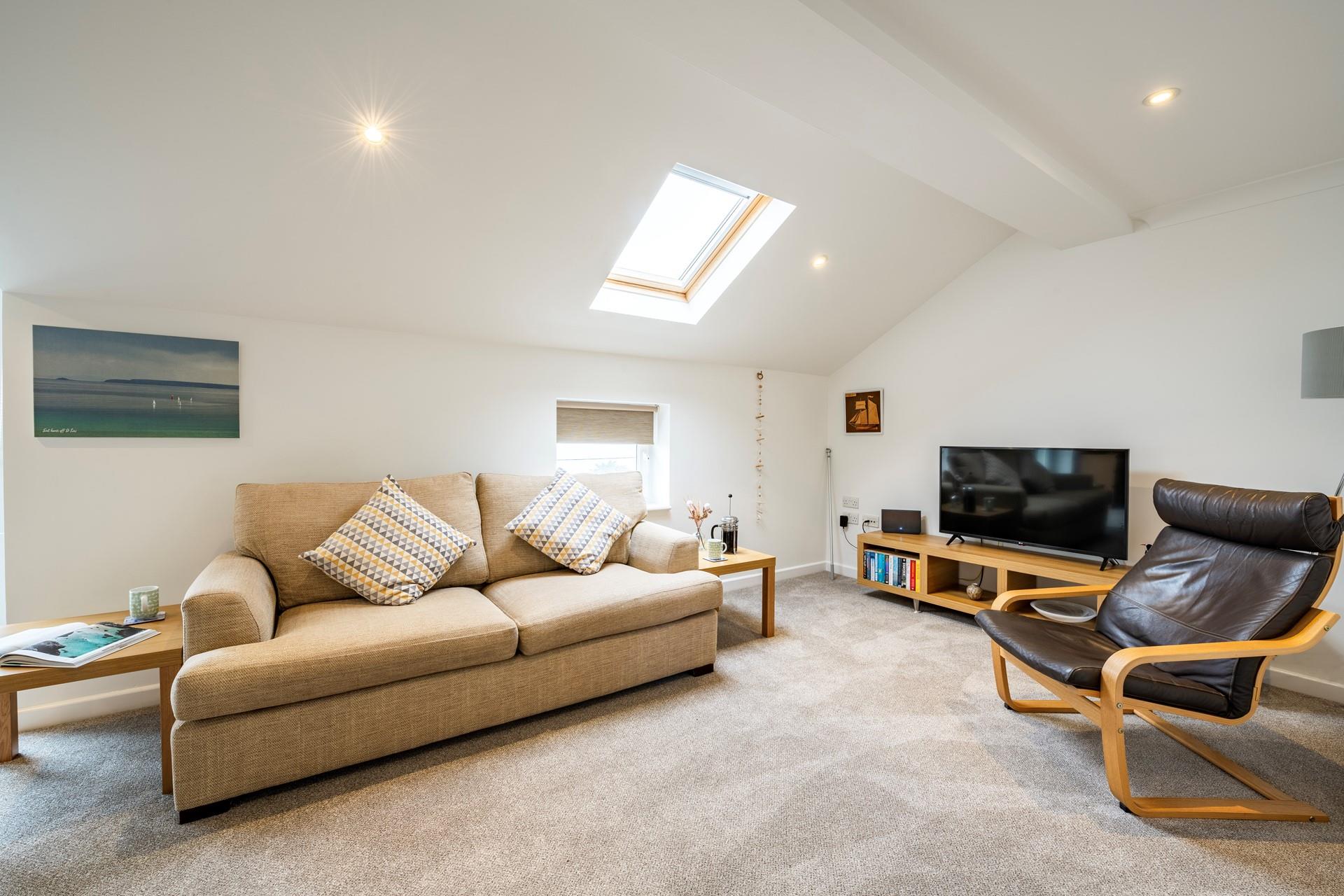 Spend evenings on the sofa enjoying a movie after a sunshine-filled day.