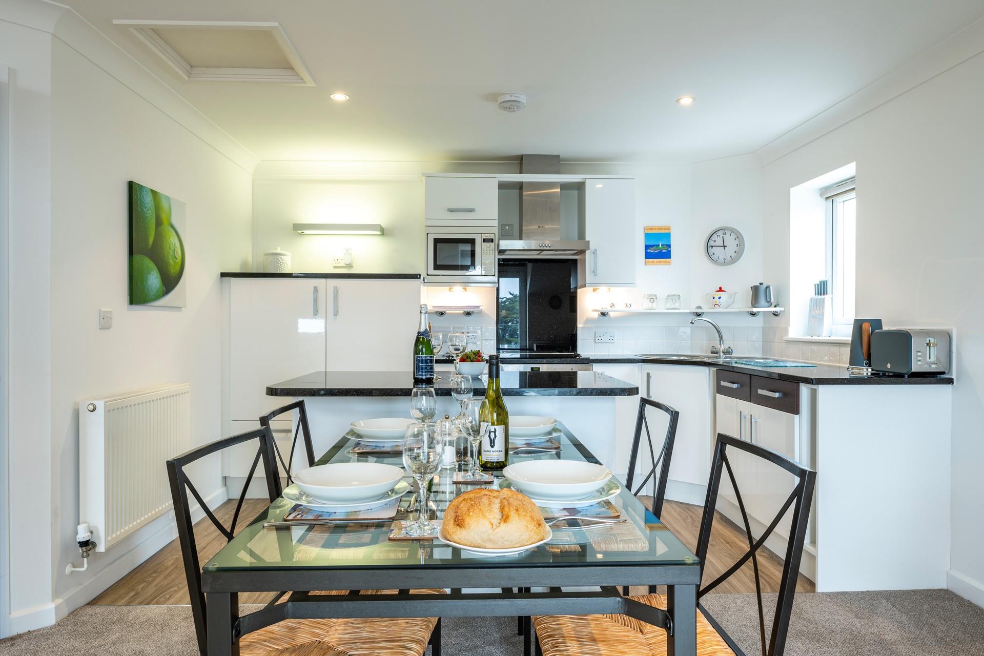 The open plan kitchen and dining area means you can spend quality time together as a family.