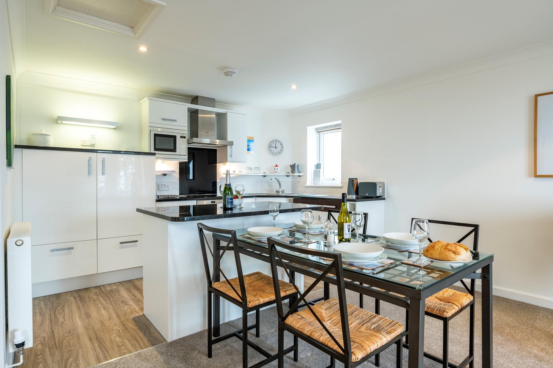 Gather the family around the dining table and enjoy a delicious meal.