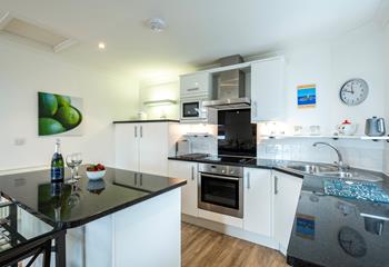 Cook up a storm in the modern and sleek kitchen.