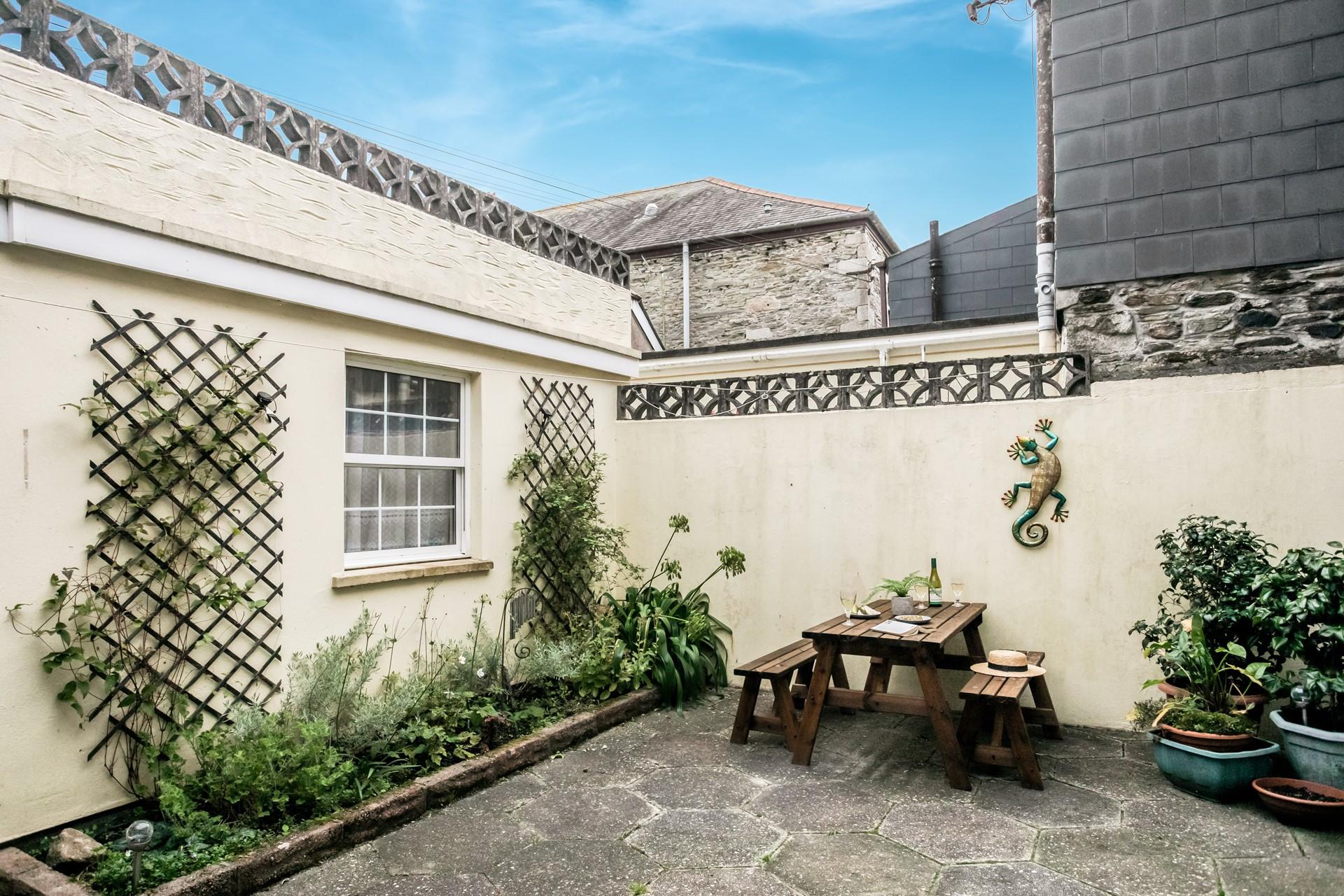 Dine alfresco in the secluded courtyard.