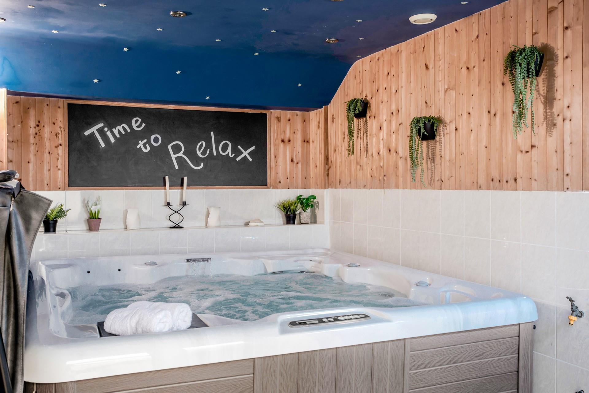 Indulge in a relaxing soak in the hot tub after walking the coast path.
