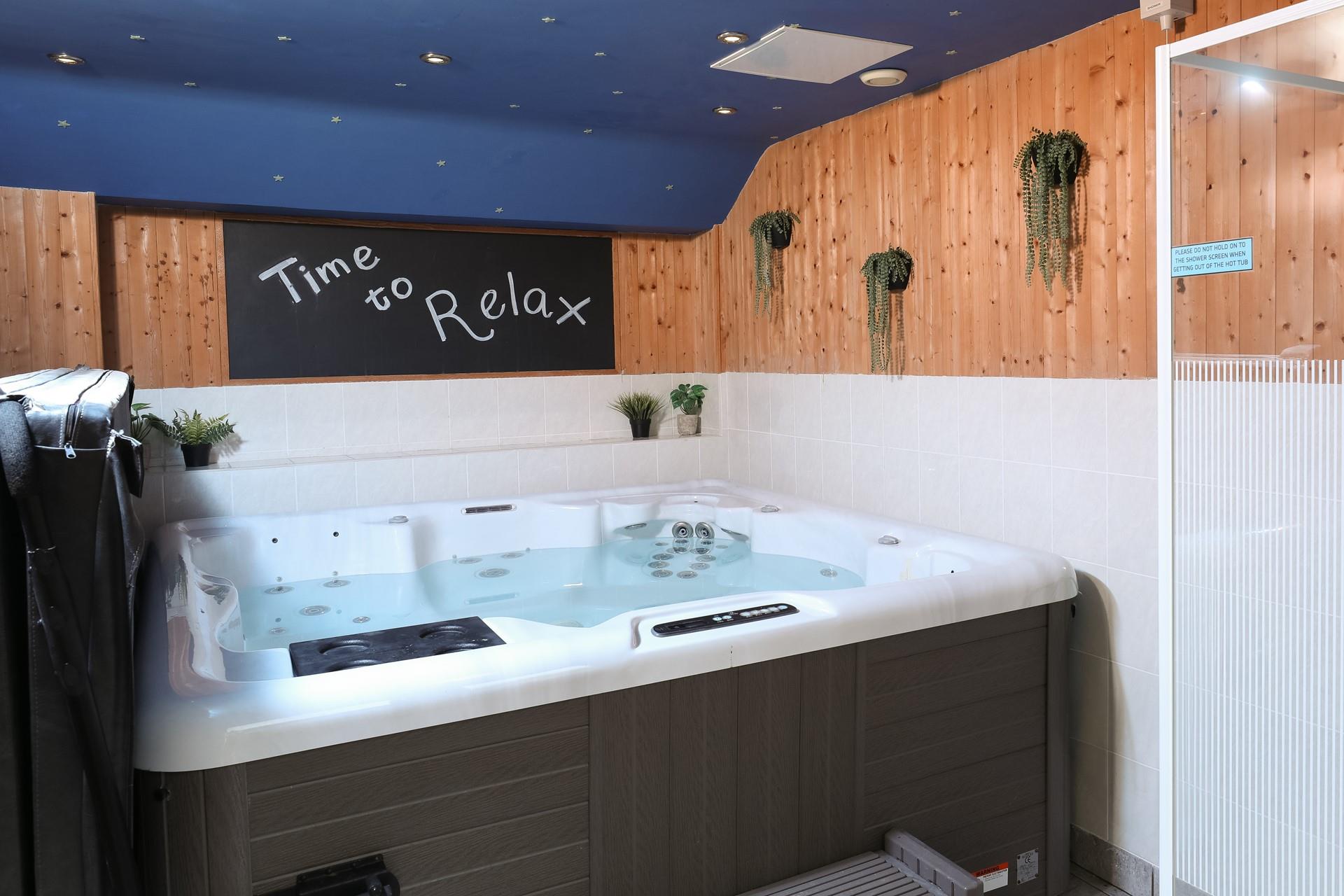 Indulge in a relaxing soak in the hot tub after walking the coast path.