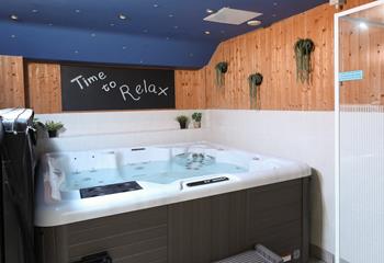 Indulge in a relaxing soak in the hot tub after walking the coast path.