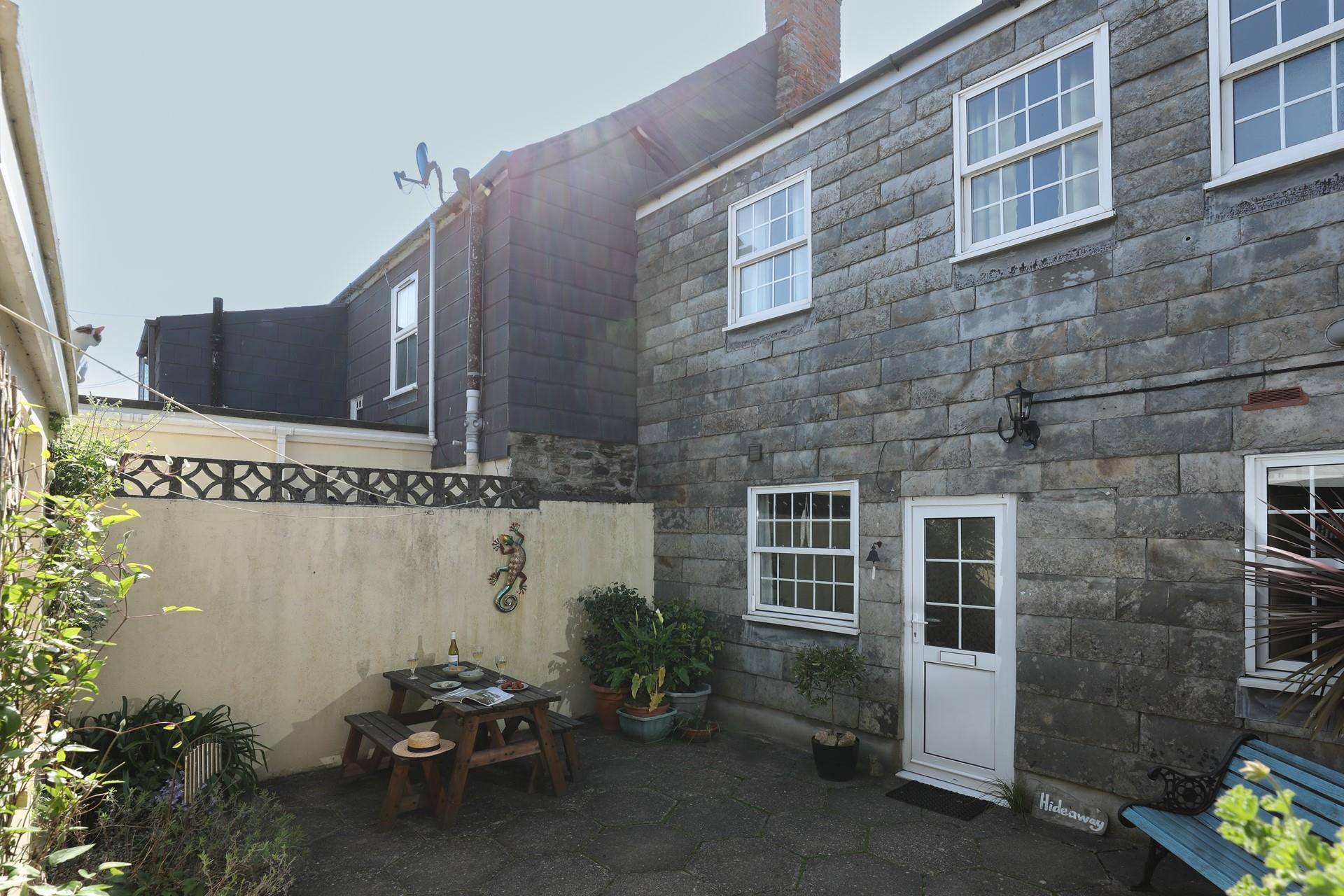 Dine alfresco in the secluded courtyard.