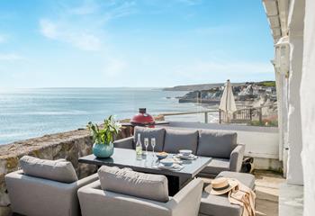 Take in the breathtaking sea views across Porthleven whilst sipping a glass of something cold, pure luxury!