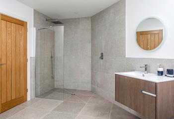 The walk-in shower is perfect for washing off sandy toes after beach days.