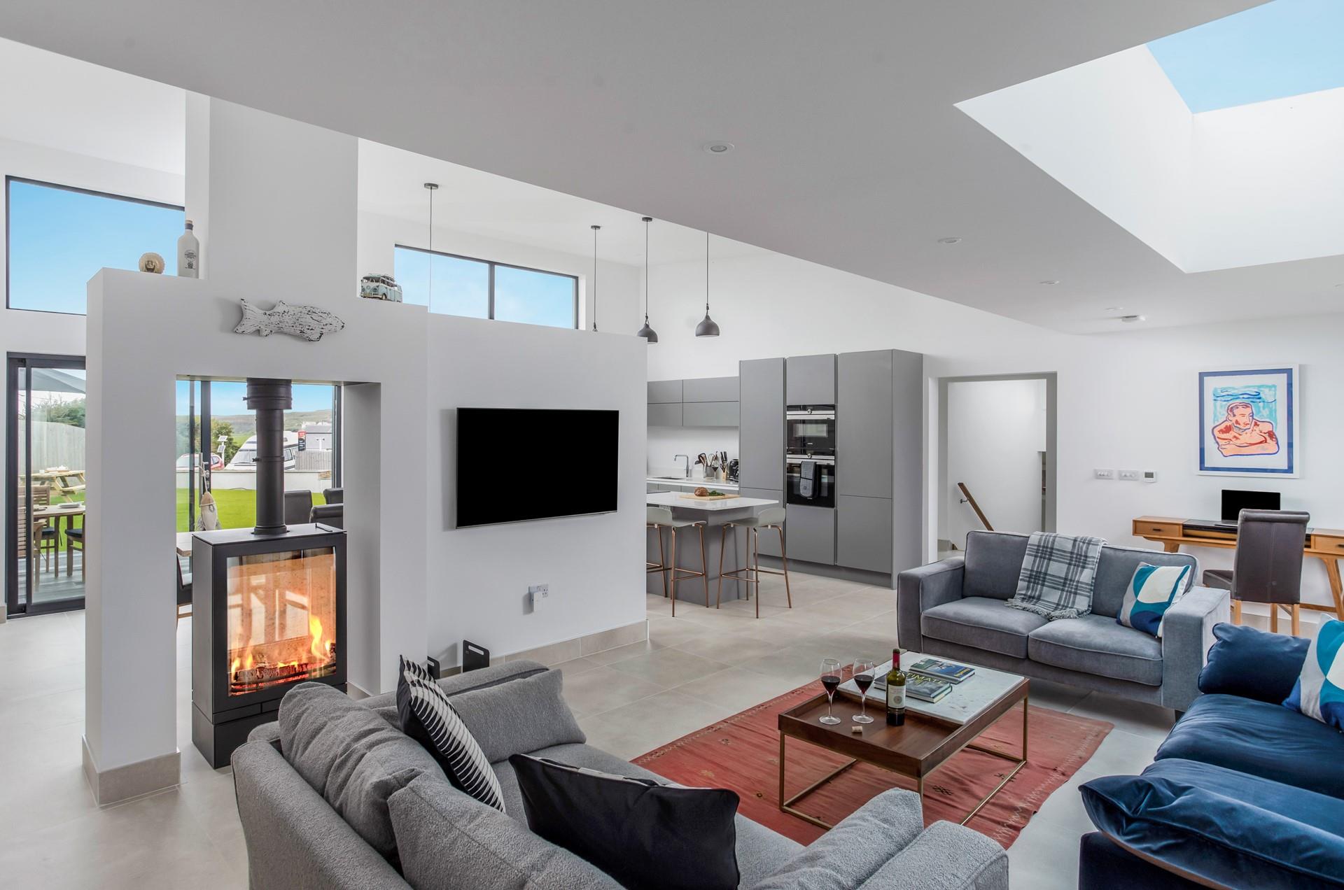 Snuggle up in front of the woodburner with a glass of wine.