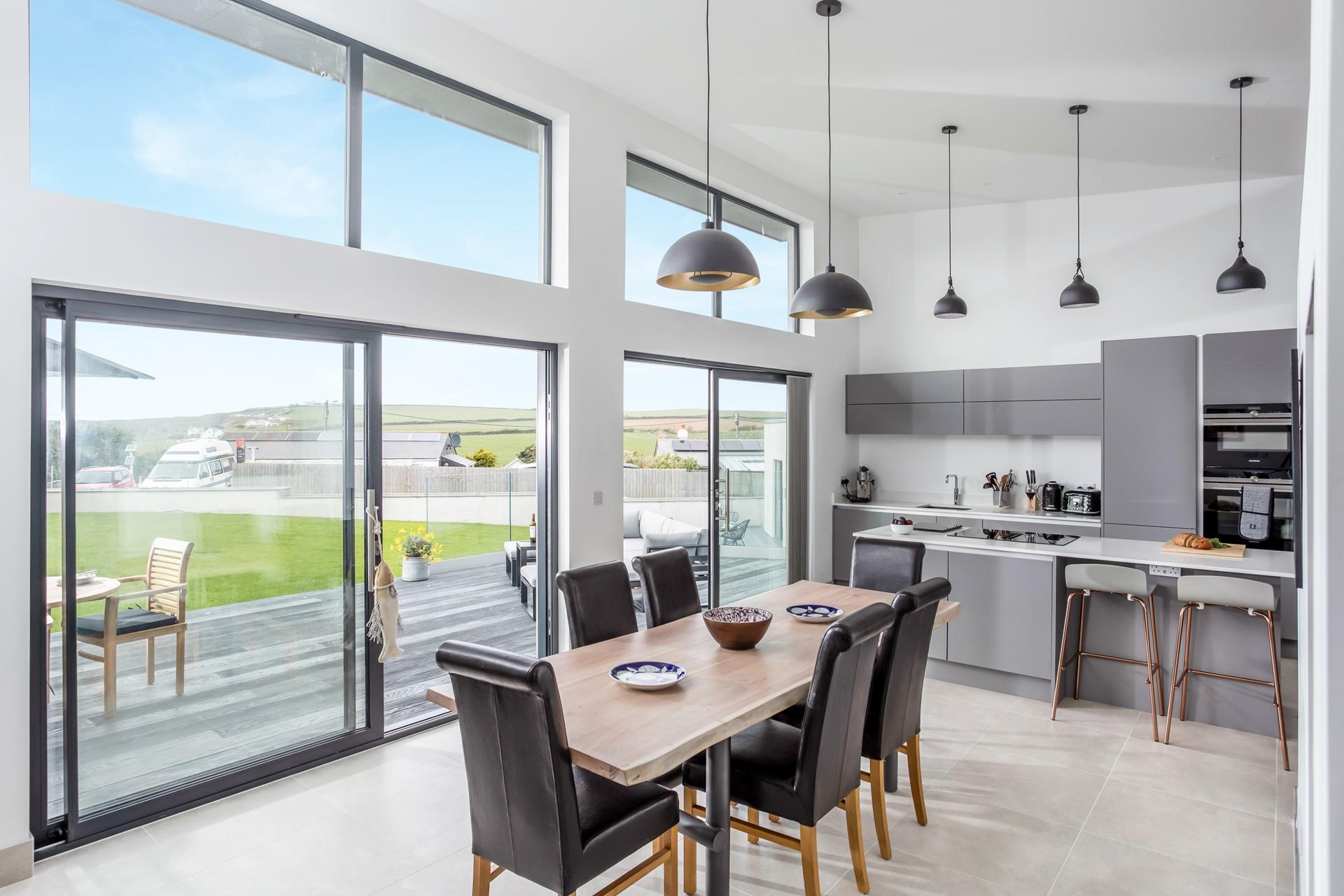 The living spaces are filled with light with modern furnishings.