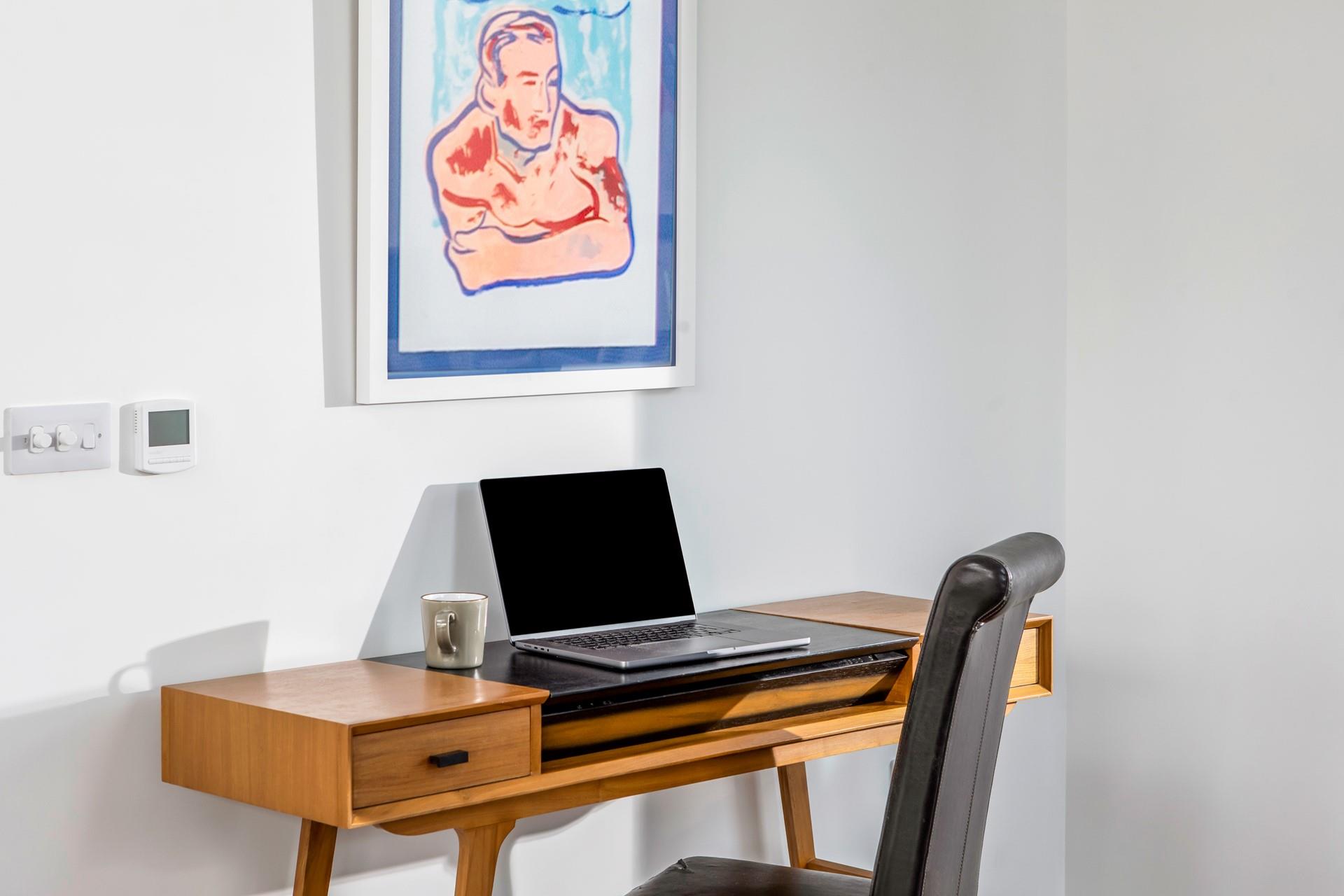 Catch up on emails at the handy desk.