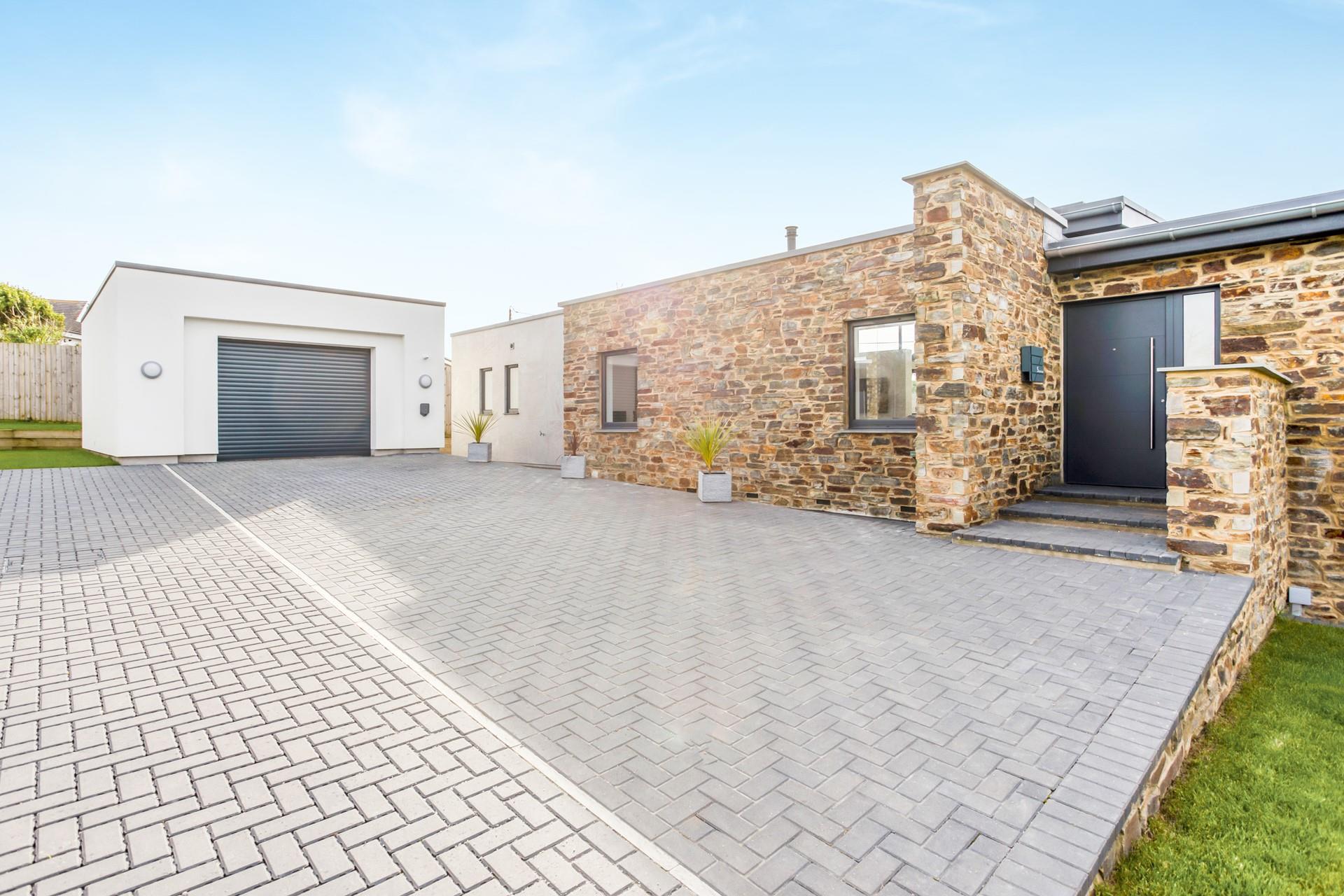 There is ample parking for several cars on the private driveway.