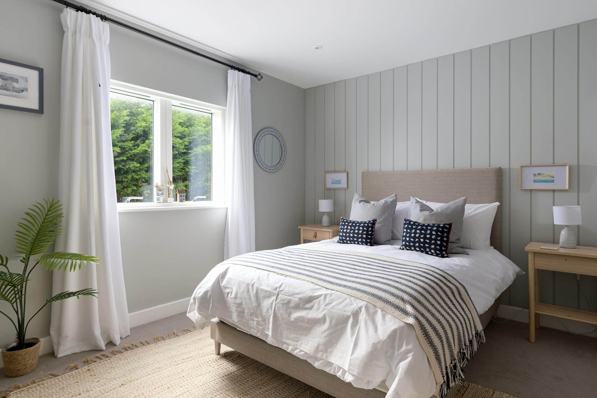 Decorated in pastel tones, the bedrooms are modern and stylish for unwinding in the evening.