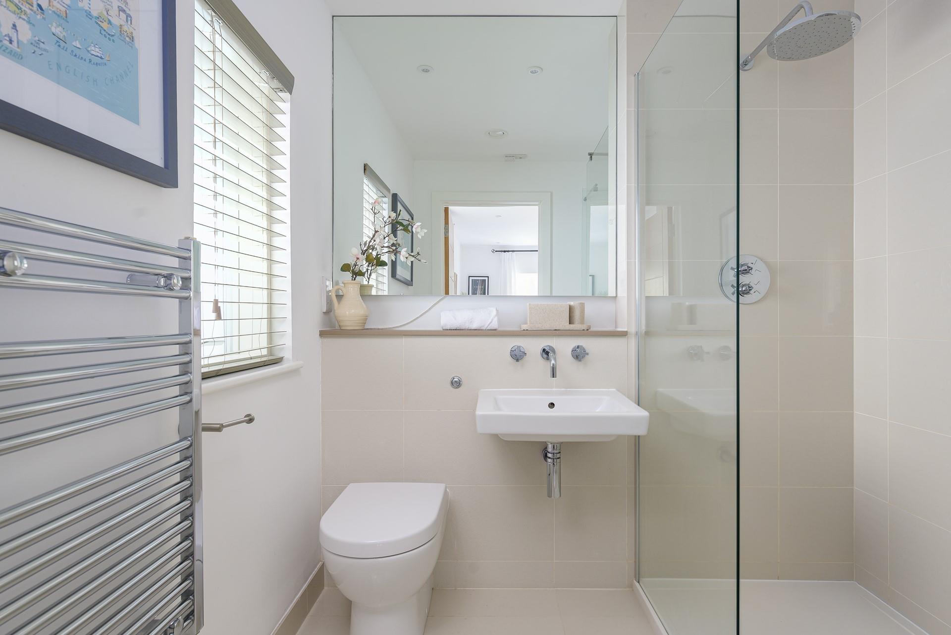Wash off sandy toes in the rainfall shower after a day on Porthminster beach.