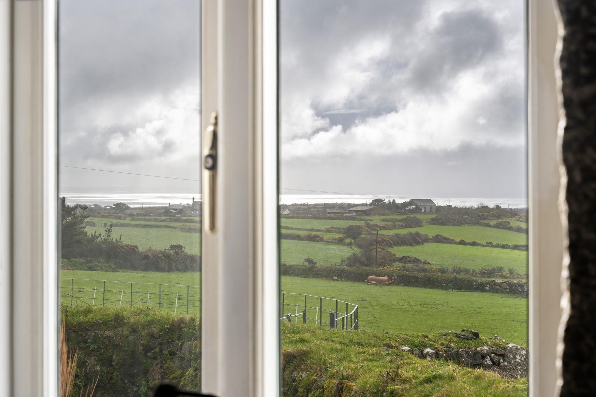 Countryside and sea views can be enjoyed from Trelowarren Barn.