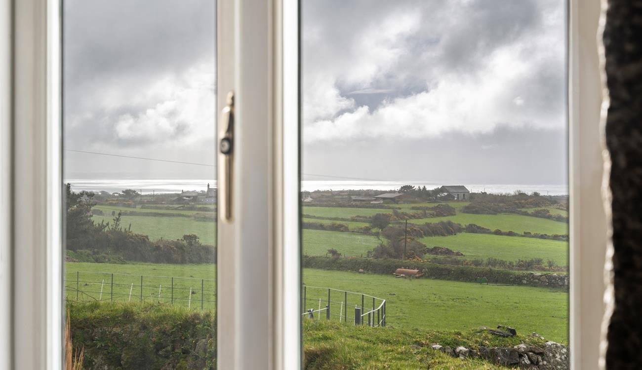 Countryside and sea views can be enjoyed from Trelowarren Barn.