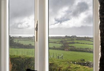 Countryside and sea views can be enjoyed from Trelowarren Barn.