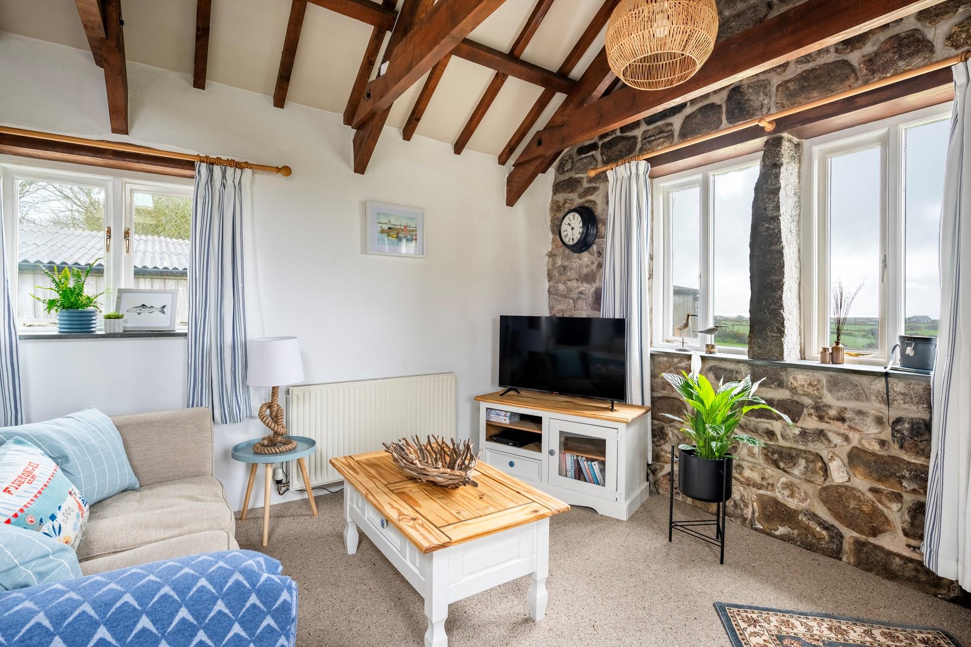 Relax and unwind with your loved one in the cosy sitting room.