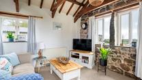 Relax and unwind with your loved one in the cosy sitting room.