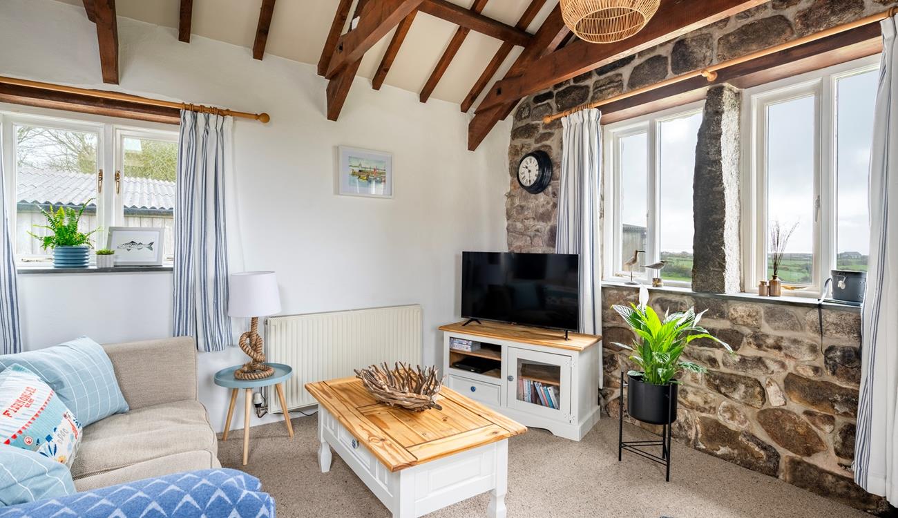 Relax and unwind with your loved one in the cosy sitting room.