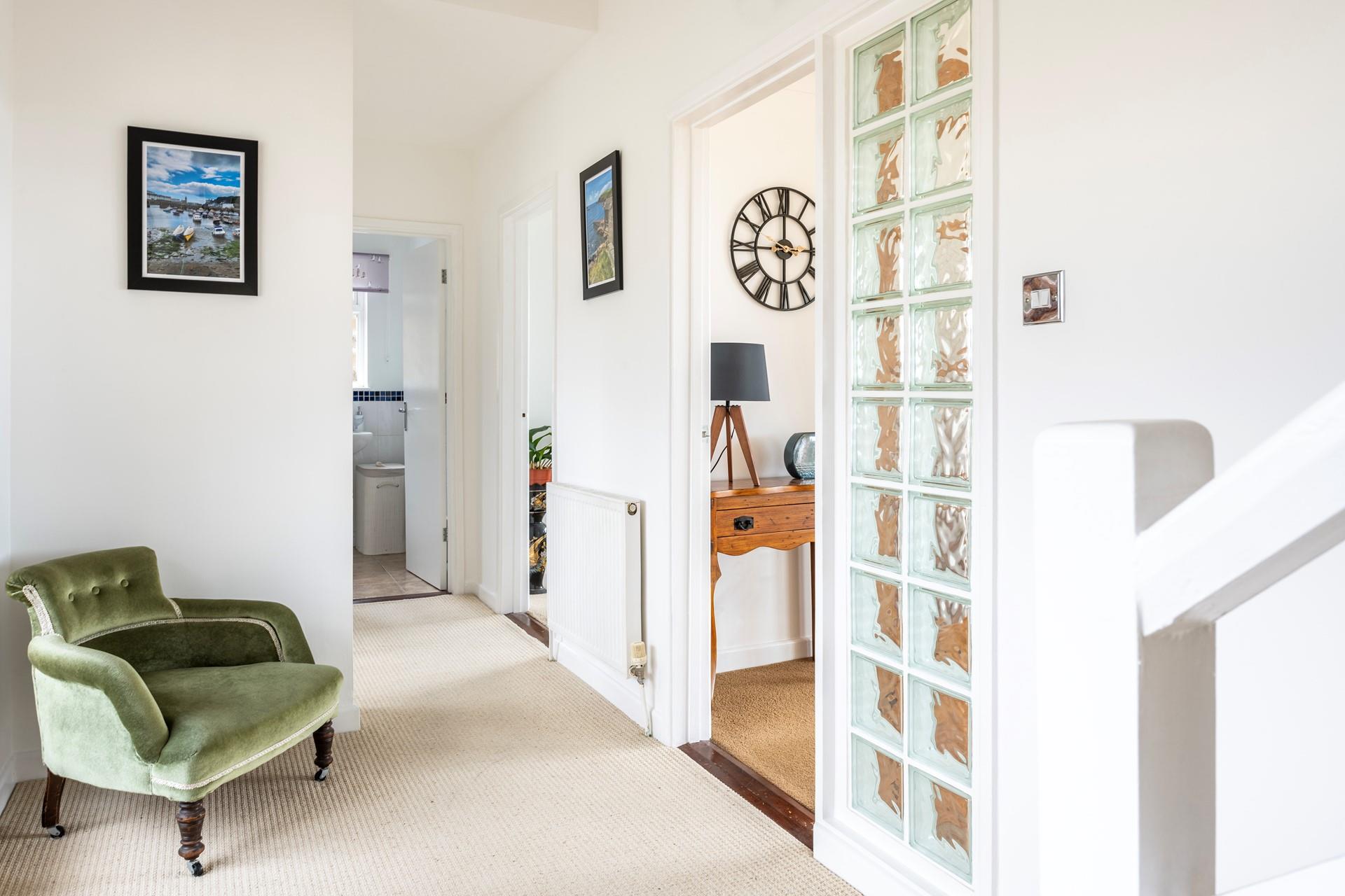 Take a quiet moment to sink into the chair and get stuck into a good book.