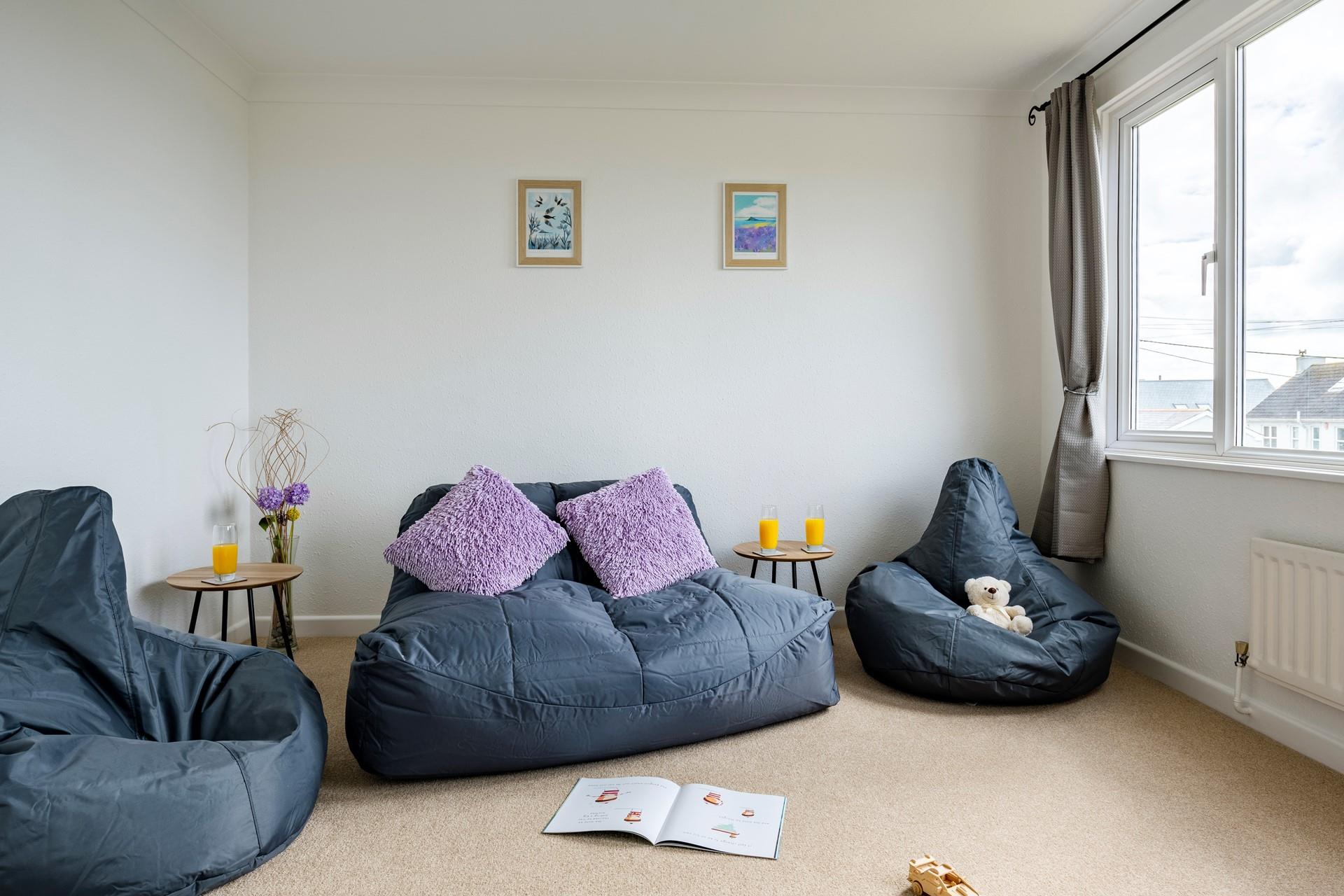 The snug is an ideal space for the kids to relax away from the adults.