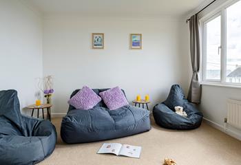 The snug is an ideal space for the kids to relax away from the adults.