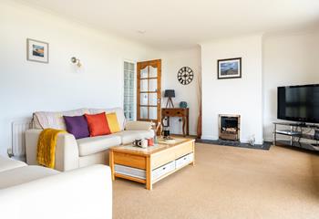 Enjoy quality time together as a family in the spacious sitting room.