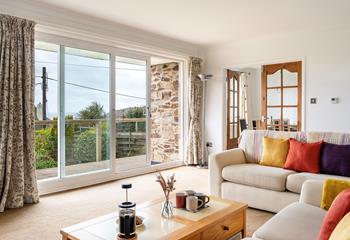 Open the patio doors and let the fresh summer breeze run through the sitting room.