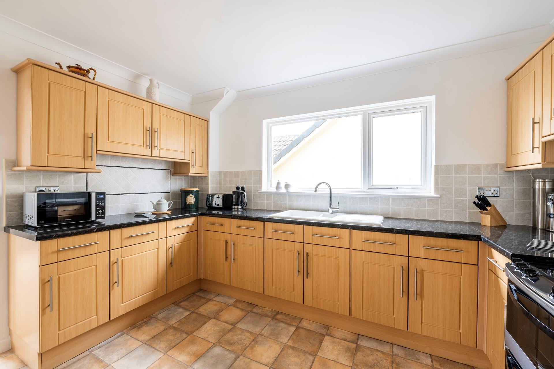 The kitchen is fully equipped to cook up a storm.