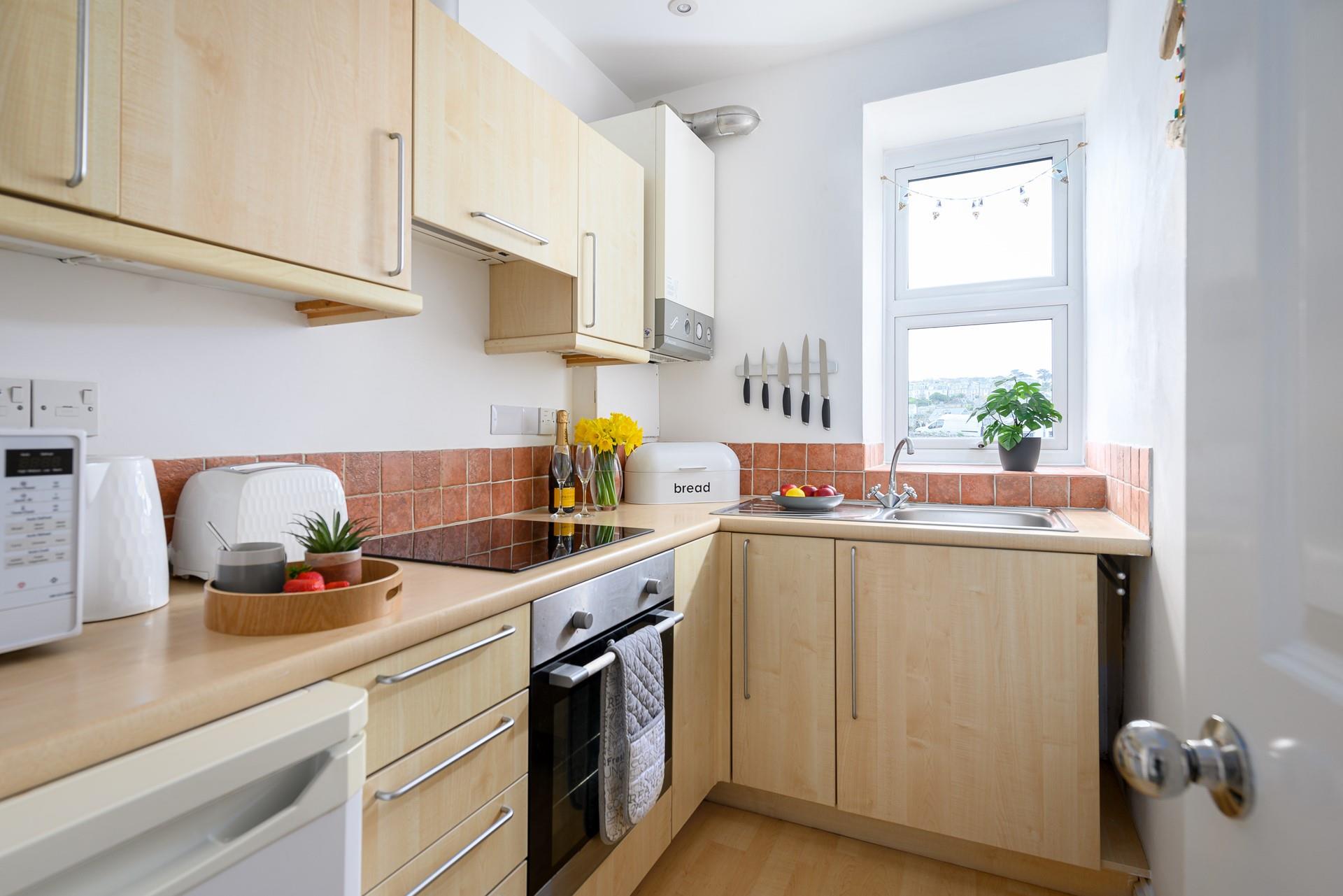 The well-equipped kitchen is perfect for cooking up a storm.
