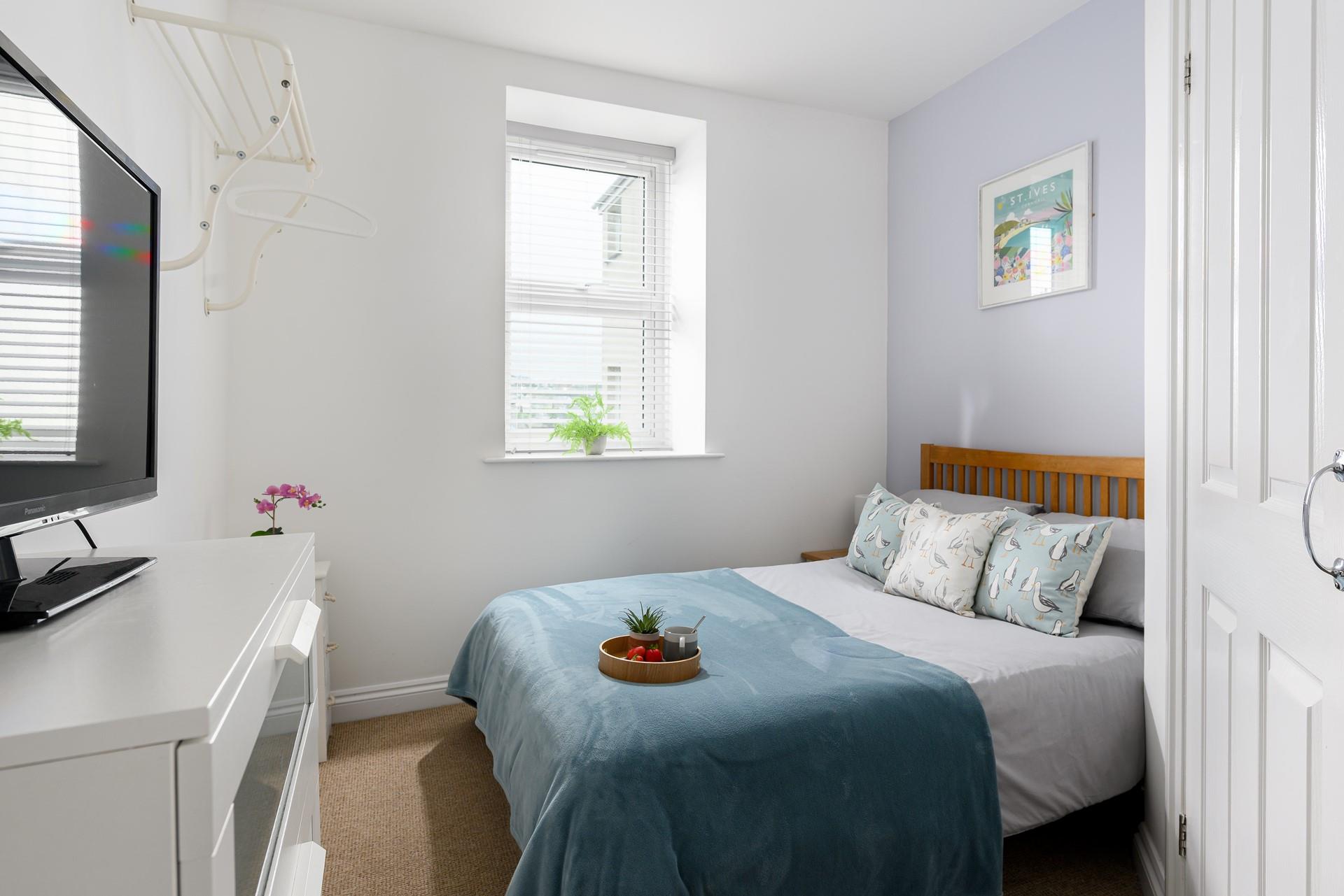 The double bed offers a peaceful night's slumber each night.