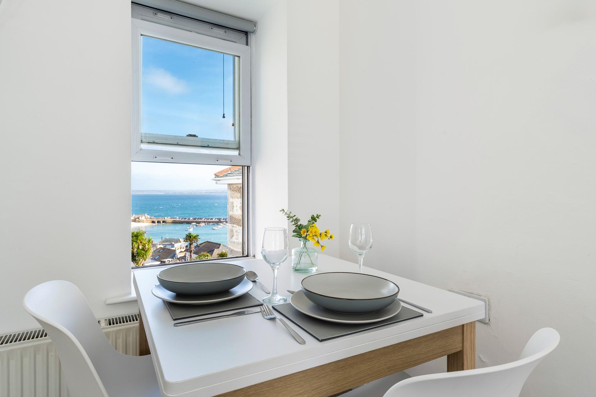 Enjoy warm pastries in the morning looking out at the harbour.