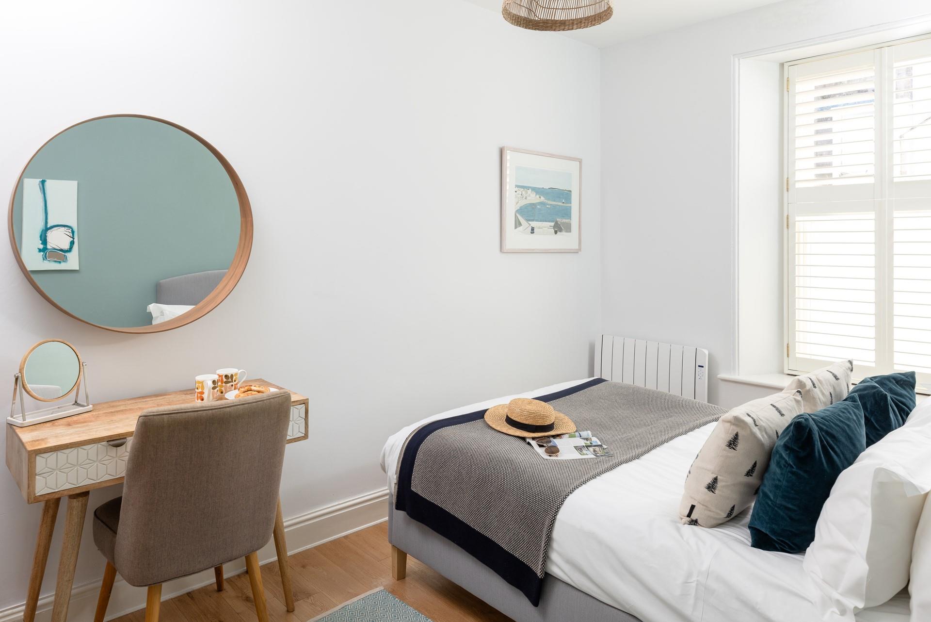 Bedroom 1 has a spacious king size bed for a peaceful night's sleep.