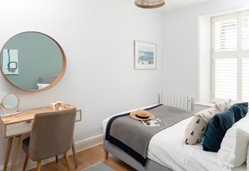 Bedroom 1 has a spacious king size bed for a peaceful night's sleep.