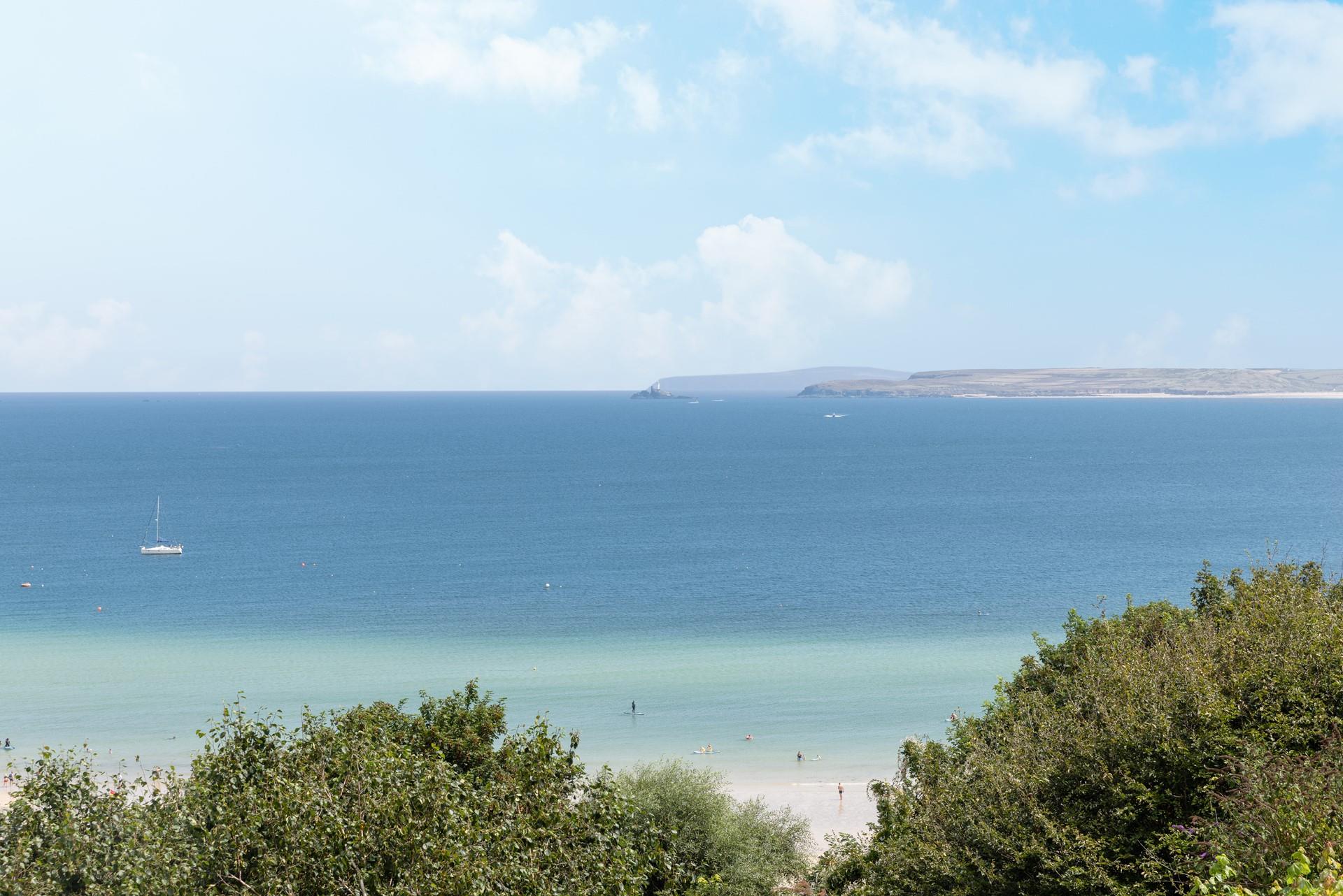 Head down to the beach for a dip in the turquoise waters.