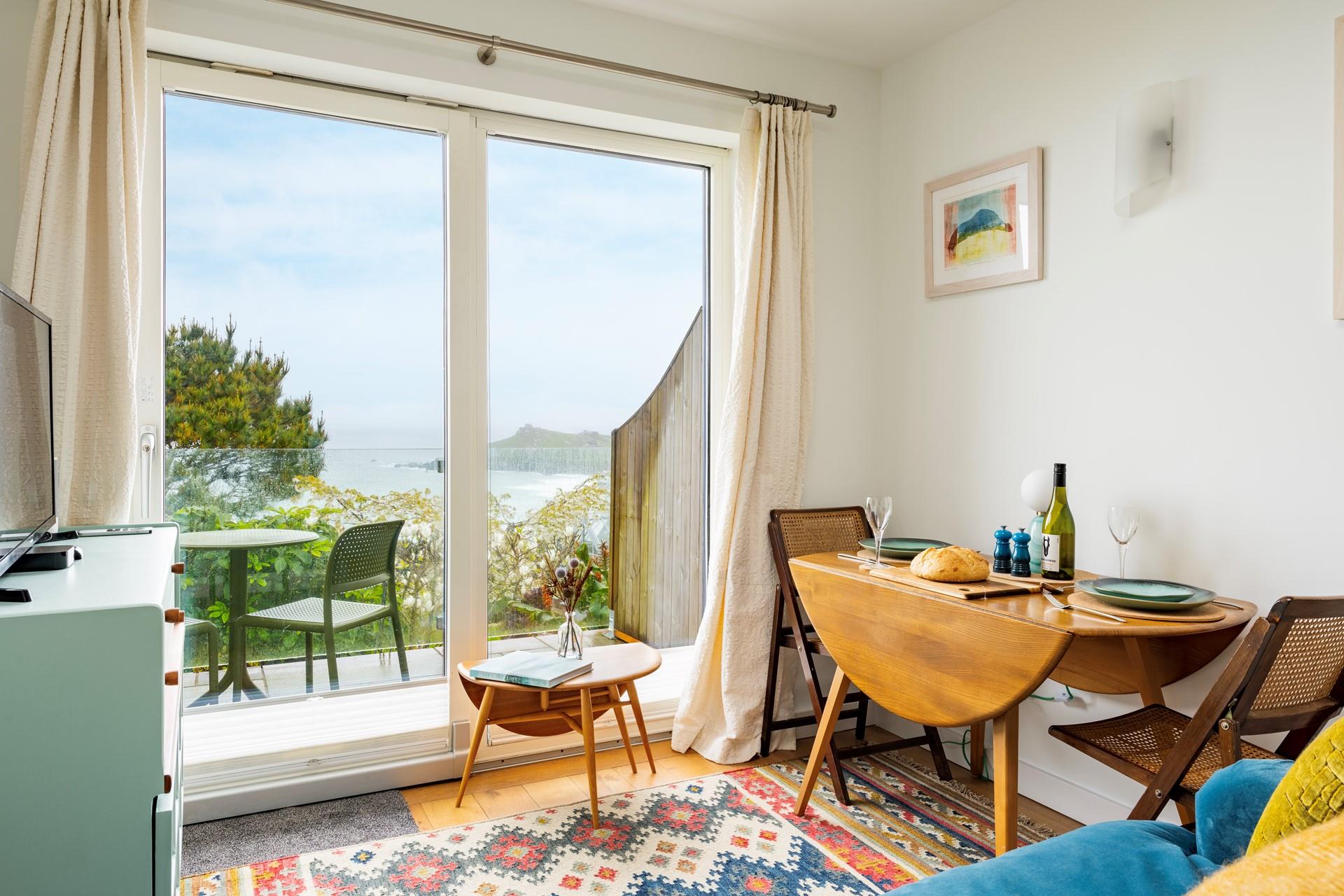 The perfect base for a couple, the studio offers stunning views across the Island.