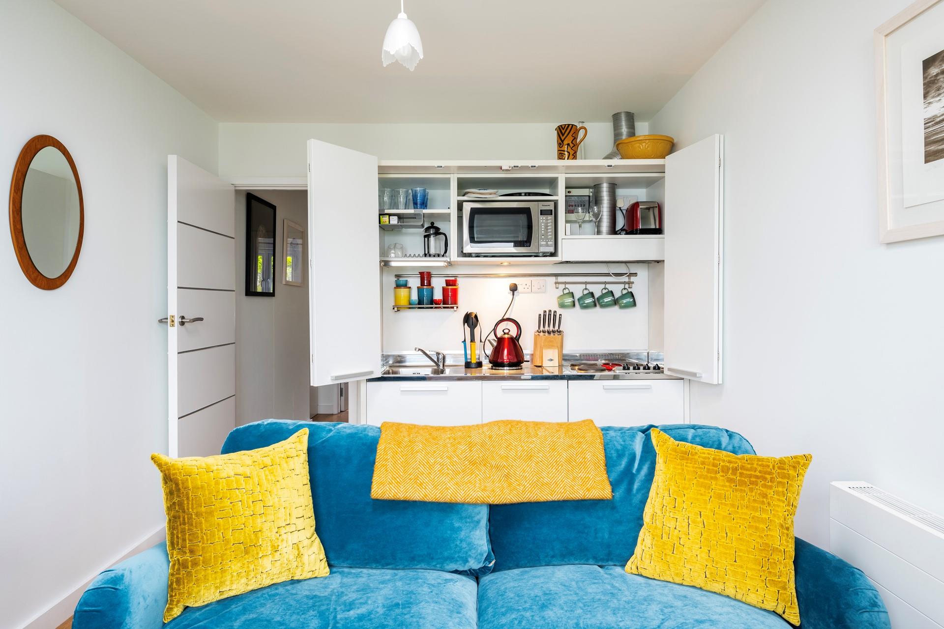 The compact but well-equipped kitchen is perfect for cooking a hearty breakfast to start the day.