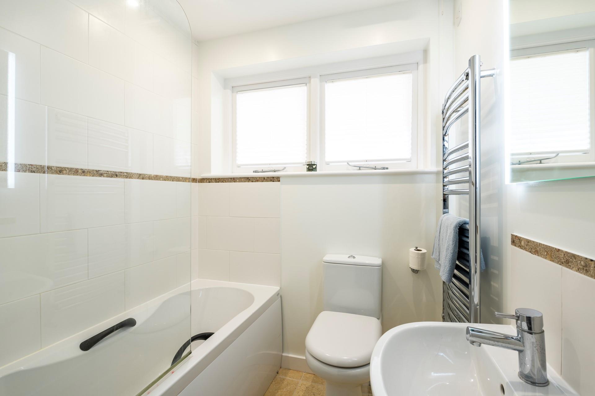 Wash off sandy toes in the shower or relax and unwind with a soak in the bath.