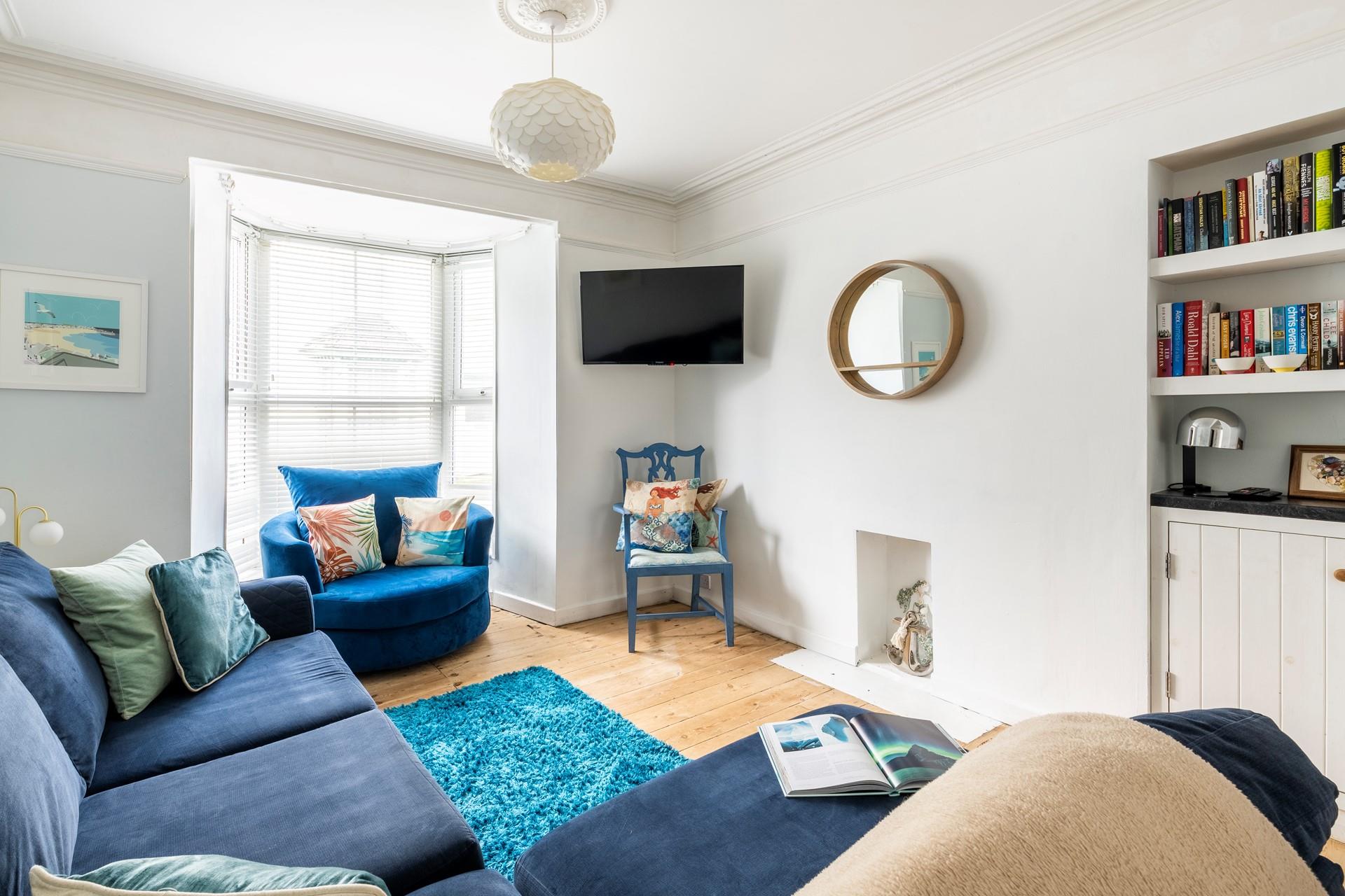 We love the mermaid decor reflecting the name of the charming cottage.