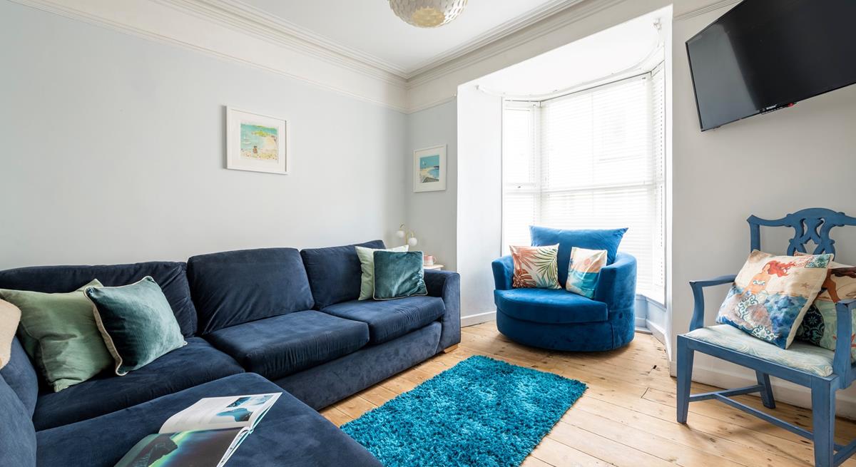 The sitting room is perfect for relaxing evenings after busy days exploring.