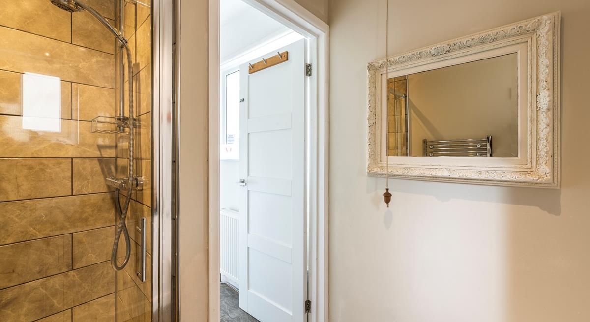 Wash off sandy toes in the shower after a day on the white sandy beach.