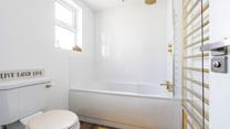 Run a relaxing bubble bath to unwind after a day of walking the South West Coast Path.