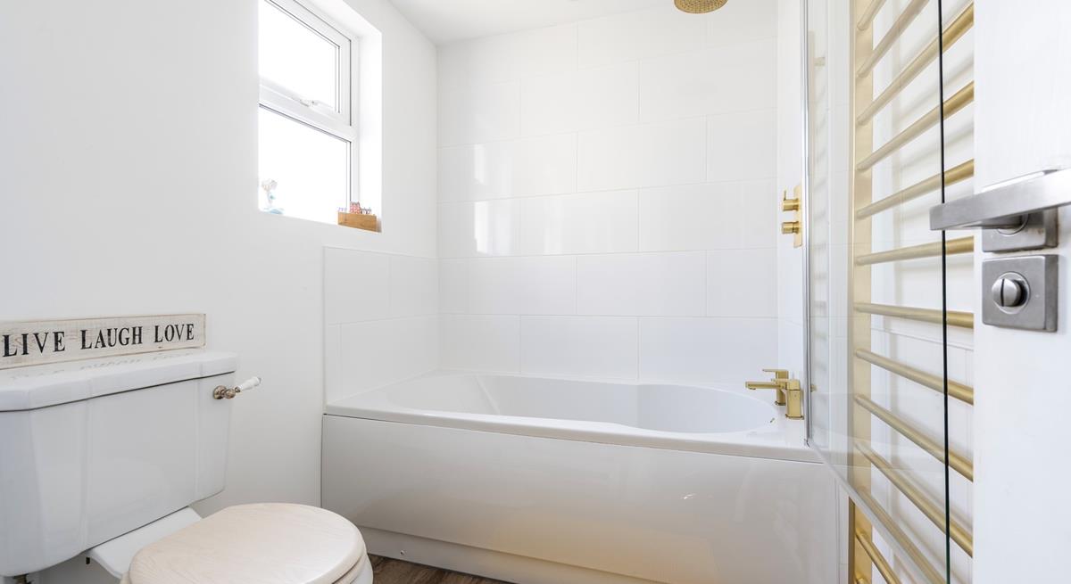 Run a relaxing bubble bath to unwind after a day of walking the South West Coast Path.