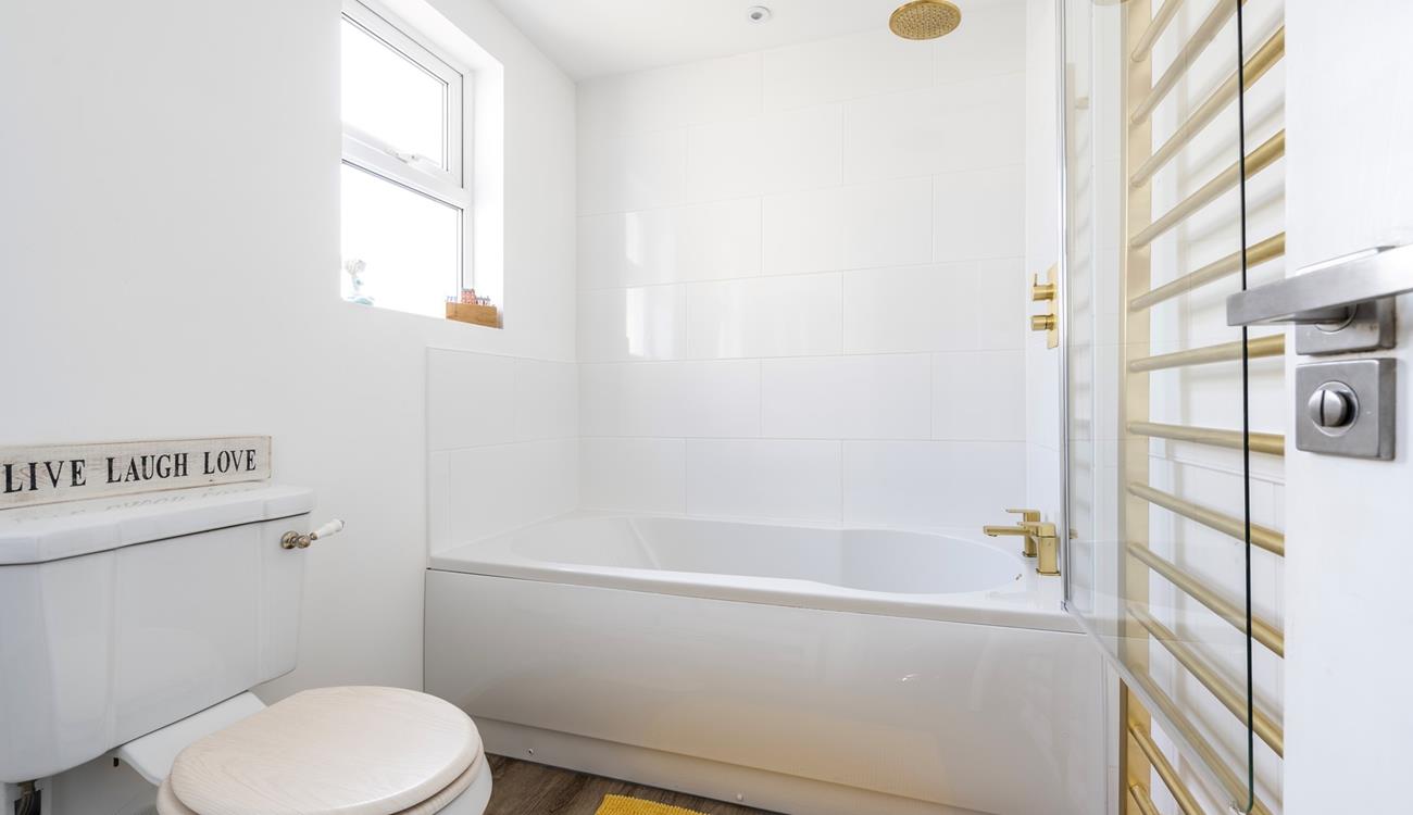 Run a relaxing bubble bath to unwind after a day of walking the South West Coast Path.