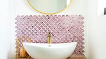 We love the splash back design behind the stylish sink!