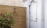 The outside shower is ideal for washing off wesuits and sandy toes. - Thumbnail Image